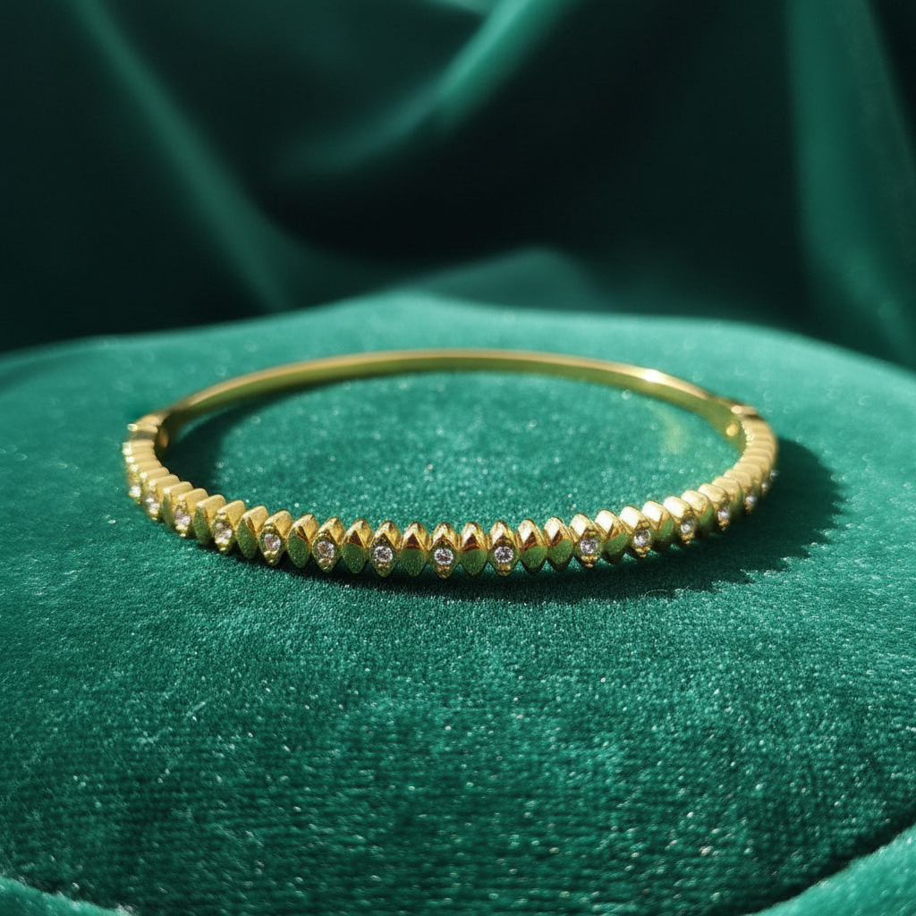 [1] 18K Gold-Plated Diamond-Cut Bangle Bracelet